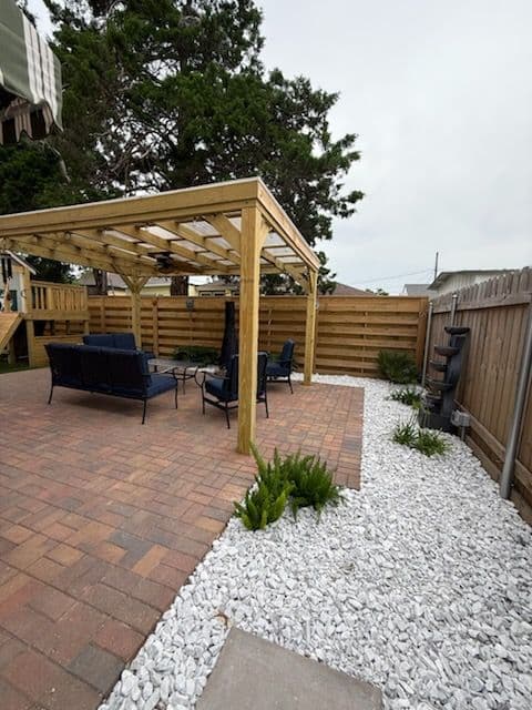 Gallery photos for Charming Patio with Wooden Pergola in River Ridge: Image #1