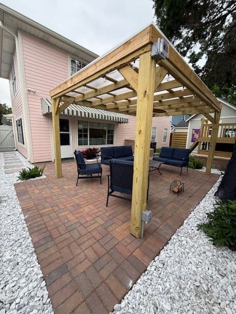 Gallery photos for Charming Patio with Wooden Pergola in River Ridge: Image #2